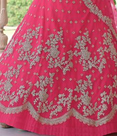 COLOR : Cranberry Pink FABRIC : Top (Blouse) - Soft Net, Bottom (Lehenga) - Soft Net, Dupatta - Soft Net WORK : Heavy Metallic Thread Embroidery, Zari Work, Cutwork, Sequins, Motifs, Lace Border OCCASION : Wedding, Reception, Sangeet, Engagement READY-TO-WEAR : NoSTITCHING : Available as semi-stitched fabric, can be stitched using standard size option (+$30). Note: There might be a slight color variation due to lighting and flash used during photoshoot. The bright shade seen is the best closer v Bollywood Style Floor-length Sets With Motifs, Bollywood Floor-length Sets With Motifs, Floor-length Sharara With Motifs For Reception, Floor-length Sets With Intricate Embroidery For Navratri, Festive Georgette Lehenga With Motifs, Festive Floor-length Sets With Motifs, Navratri Sets With Intricate Embroidery In Floor-length, Fitted Georgette Lehenga With Motifs, Fitted Floor-length Sharara With Motifs