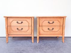 two wooden dressers side by side with handles