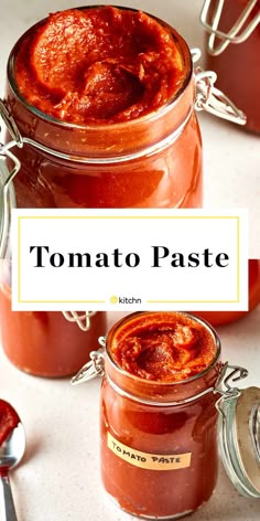 two jars filled with tomato paste sitting on top of a table