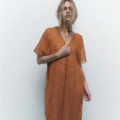 Zara Midi Tunic Dress With V-Neckline And Short Sleeves. Front Pleat Detail. Size Xl. Brand New With Tags. Armpit To Armpit 30”, Length 46”/49” Orange V-neck Summer Maxi Dress, Elegant V-neck Midi Dress As Beach Cover-up, Orange V-neck Midi Dress For Vacation, Chic V-neck Beach Cover-up Dress, Orange V-neck Midi Dress For Beach, Summer Orange V-neck Midi Dress, Orange V-neck Maxi Dress For Beach, Brown V-neck Midi Dress, Viscose V-neck Midi Dress For The Beach