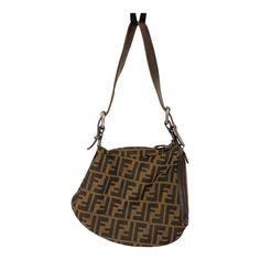 Fendi  FF print shoulder Oyster bag. Zucca FF print shoulder hobo bag. Fendi Oyster vintage shoulder bag in great condition.  Inside and outside are in great condition.  Go for a modern yet intriguing finish with this stylish hobo by Fendi. Closure/Opening: top and side zipper Hardware: matte gunmetal hardware Made in Italy. Highlights: brown leather/canvas FF logo print Adjustable shoulder strap Top zip fastening Internal logo patch. Dimensions: Total Length with shoulder strap 18 in.  Bag: 8 i Fendi Aesthetic, Fendi Oyster Bag, Fendi Embroidery Bag, Fendi Peekaboo Bag, Fendi Monogram Bag, Brown Fendi Bag, Vintage Shoulder Bag, Fendi Baguette, Strap Tops