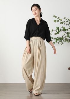 "Cool and comfortable for hot summer days, this apricot wide leg pants is elegant and stylish.    It is a wonderful wardrobe staple that's a timeless classic you'll wear again and again. Cotton materials, comfortable, breathable, refreshing and soft fabric. All our items are Tailored and Handmade and Made to Order ,I can make Any Size . I design new styles every week, please collect my store. I believe that you will meet your favorite styles. ★★FEATURES 70% cotton, 30% chinlon Two side pockets E Relaxed Fit Wide Leg Pants In Khaki, Versatile Baggy Wide Leg Pants For Spring, Khaki Wide Leg Cargo Pants, Casual Beige High-waisted Harem Pants, Khaki Wide-leg Harem Pants, Versatile Beige Wide Leg Pants, Versatile Beige Wide-leg Pants, Summer Khaki Cotton Wide Leg Pants, Beige Relaxed Fit Harem Pants For Spring