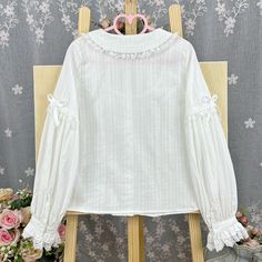 A perfect blend of comfort and style for the transitional seasons of spring and autumn. Crafted from soft, breathable cotton, this blouse promises a cozy fit while maintaining its elegant appeal. The charming Peter Pan collar adds a touch of classic sophistication, with its long sleeves, it provides just the right amount of warmth for those breezy days.   	 		 			Size 			S 			M 			L 			XL 			2XL 		 		 			Shoulders 			35 			36 			37 			38.5 			40 		 		 			Bust 			90 			94 			98 			102 			106 Gothic Shirts, Girl Shirts, Vintage Gothic, Chiffon Long Sleeve, Cozy Fits, Mesh Long Sleeve, Pink Plaid, Shirt For Women, Fashion Vintage