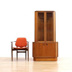 "**Please Note: SHIPPING IS NOT FREE. Please read entire description.** This fabulous mid century corner cabinet was manufactured by Turnidge of London during the 1960s. Produced in teak, this minimalist cabinet has a sleek shape, with two upper shelves and bottle/glass storage below, it has quality construction throughout. DIMENSIONS: 33.5\" wide x 20\" deep x 67\" high CONDITION: This fantastic side table is in excellent vintage condition. Please study the pictures carefully for a more accurat Turnidge Cabinet, Bar Buffet Cabinet Corner, Corner Hutch Mid Century, Corner Buffet Cabinet, Primitive Corner Cabinet, Corner Buffet, Mid Century China Cabinet, Corner Bar Cabinet, Corner Hutch