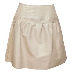 GUARANTEED AUTHENTIC VALENTINO BEIGE A-LINE PLEATED SKIRT Details: - Timeless A-line silk skirt in a khaki beige color. - Yoke waist. - Pleating. - Side zipper closure. - Unlined. Material: 80% Cotton, 20% Silk Size: 4 Measurements (Approximate laid flat, Alterations By Chanel): - Waist, 14.25" (higher waisted) - Hip, 18" - Total Length, 19" (tip of front waistline to bottom front hem) To Our Customers: - We consider it a privilege to serve as your luxury fashion concierge. Whether you are looki Yoke Skirt, Valentino Skirt, Floral Lace Skirt, Valentino Black, Embroidered Skirt, Velvet Pants, Brown Coat, Silk Skirt, Black Stretch