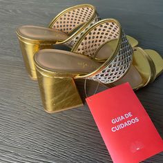 Brand New Brazilian Designer Luiza Barcelos. Size 9us. Gold Round Toe Sandals For Night Out, Gold Sandals For Summer Night Out, Gold Sandals For Night Out In Summer, Chic Gold Mules With Stacked Heel, Gold Closed Toe Sandals For Night Out, Gold Block Heel Mules For Summer, Chic Party Mules With Stacked Heel, Summer Mules With Round Toe For Night Out, Summer Round Toe Mules For Night Out