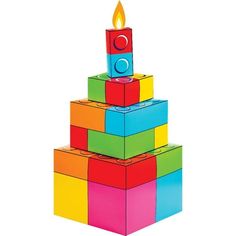 a birthday cake made out of blocks with a lit candle on top that is brightly colored