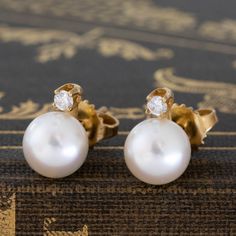 These sweet diamond and pearl stud earrings are such a sweet and classic duo, a perfect daily earring, or even a bridal moment! Pearl studs are having a moment right now, and we love that these incorporate a little diamond sparkle at the posts. They're also from T&Co - an added bonus if you ask us! 18kt yellow gold Diamonds are estimated to be G/H colors & VVS clarities. GIA standards Please see qualitative report for more information. Elegant Earrings With Timeless Design As Gift, Elegant Gift Earrings With Timeless Design, Elegant Timeless Design Earrings As Gift, Timeless Diamond Earrings For Wedding, Elegant Diamond Earrings With Timeless Design, Timeless Diamond Wedding Earrings, Timeless Diamond Pearl Earrings, Timeless Pearl Earrings As Gift, Timeless Diamond Accented Earrings For Wedding