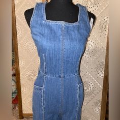 This Jumper Gives Me Vintage Vibes From The 70s But It's Actually Brand New With Tags From Gap! It Has A Cinched Waste That Is Sure To Accentuate All The Right Places. The Flare Pants With Make Your Waste Look Even Smaller! Retro Cotton Denim Jumpsuit In Medium Wash, Retro Medium Wash Cotton Denim Jumpsuit, Vintage High Rise Denim Jumpsuit, Retro Dark Wash Denim Jumpsuit, Retro Medium Wash Denim Jumpsuit Overall, Retro Medium Wash Denim Jumpsuits And Rompers, Vintage Denim Dark Wash Jumpsuits And Rompers, Vintage Cotton Fitted Denim Jumpsuit, Retro Denim Jumpsuits And Rompers In Medium Wash