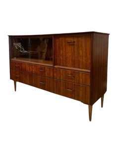 a wooden cabinet with glass doors and drawers