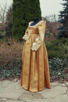 Hey, I found this really awesome Etsy listing at https://www.etsy.com/listing/990136768/renaissance-gown-gold-color-robe Regency Style Victorian Costume Dress For Medieval Festivals, Regency Style Victorian Dress For Medieval Festivals, Vintage Medieval Dress For Theater, Vintage Medieval Dress For Fancy Dress, Vintage Medieval Dress For Medieval Festivals, Victorian Medieval Dress For Theater With Historical Design, Victorian Medieval Dress With Historical Design For Theater, Elegant Medieval Dress For Fancy Dress, Regency Style Medieval Dress For Costume Party