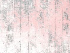 an old wooden wall painted pink and grey