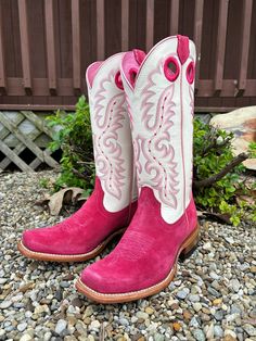 Designed in collaboration with 26x World Champion Cowboy Trevor Brazile, the Relentless collection of Futurity boots is a modern take on tradition for today’s cowgirl. With a cutter toe, roughout foot, and bright, bold shaft, this punchy pair is guaranteed to turn heads. Superior comfort and stability, plus an extra layer of heel-to-toe cushioning, keeps you on your toes. ATS® technology provides ergonomic support whether you're on your feet or in the saddle TekStep provides toe-to-heel cushion for comfort Genuine leather foot and upper Removable All Day Cushioning insole Hand-nailed and color stained leather sole Duratread™ heel tap Resoleable Goodyear welt construction Six-row stitch pattern Pull holes Easy pull-on style Cutter Toe Leather Lining Shaft Height - 13" Shaft Circumference - Western Round Toe Boots, Western Style Boots For Country Events, Western Boots With Round Toe For Rodeo, Western Round Toe Boots For Rodeo, Country Style Boots With Round Toe For Country Events, Country Style Round Toe Boots For Rodeo, Western Style Fitted Boots For Country Events, Fitted Western Boots For Country Events, Pink Western Boots With Snip Toe