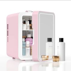 an open pink and white cabinet containing skin care products