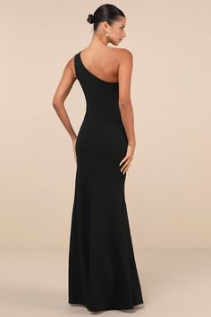 Leave the crowds speechless at the sight of you in the Lulus Mesmerizing Energy Black Cutout One-Shoulder Mermaid Maxi Dress! This exquisite dress has a stretchy crepe knit fabrication that shapes a one-shoulder neckline with a sexy cutout strap that flows into a darted bodice with an asymmetrical mesh insert at the center. The figure-skimming silhouette features asymmetrical seaming as it continues into a flattering mermaid skirt with an elegant maxi hem. Fit: This garment fits true to size. Le Fitted One Shoulder Mermaid Dress For Gala, One-shoulder Fitted Mermaid Dress For Gala, Fitted One-shoulder Mermaid Dress For Gala, One-shoulder Elastane Evening Dress, Elastane One Shoulder Dress For Parties, Elegant One Shoulder Elastane Evening Dress, Elegant One Shoulder Elastane Dress For Evening, Fitted One Shoulder Maxi Dress With Sweep Train, Elegant One-shoulder Elastane Evening Dress