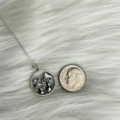 Calling all cottage witches - this beautiful sterling silver mushroom necklace makes the perfect accessory to add to your collection. A sterling silver mushroom charm pendant featuring an adorable little snail in the design comes on a sterling silver cable chain necklace. Choose between a 16", 18" or 20" length chain. Sterling silver mushroom necklace Comes in a jewelry box tied with ribbon; free gift wrap available Care card included on how to maintain the quality of your sterling silver jewelr Witch Mushroom, Snail Necklace, Necklace Pendent, Cottage Witch, Mushroom Necklace, Mushroom Jewelry, Soft Spot, Pendent Necklace, Care Card