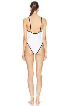 Find LPA Alessa One Piece In White on Editorialist. LPA Alessa One Piece in White Self: 80% polyamide 20% elastane Lining: 100% polyester. Made in Indonesia. Hand wash. Adjustable shoulder straps. LPAR-WX245. LPX270 U24. About the designer: Since its launch in 2016, the eponymous LPA label perfectly translates its elevated yet casual aesthetic into a cohesive vision. Epitomizing feminine Italian romance meets California tomboy, the ready-to-wear collection fashioned by Lara Pia Arrobio encapsulates the quintessential cool girl spirit with a raw, unapologetic attitude. Sporty Stretch Swimwear Made Of Polyamide, Sporty Stretch Nylon Swimwear, Sporty High Stretch Nylon Swimwear, Chic White Nylon Swimwear, Workout Swimwear With Minimal Stretch, Athleisure Stretch Nylon Swimwear, Sporty Second-skin Swimwear Made Of Elastane, Sporty Second-skin Elastane Swimwear, Sporty Stretch Swimwear In Polyamide