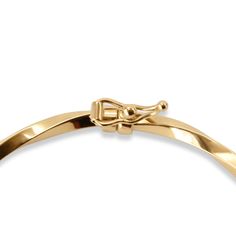 PRODUCT DETAILS In 18k solid gold, this bangle is a classic bangle twisted delicately. It is easy to wear and secured with a clasp closing to ensure it is both easy to put on and take off. 18k Solid Gold - nothing else Size: 2*2.3in Width: 2.5mm Average Weight: 3.8g Made in Italy Timeless Tarnish-resistant Yellow Gold Bangle, Flexible Yellow Gold Bangle For Formal Occasions, Formal Flexible Yellow Gold Bangle, 14k Gold Hoop Bracelet With Polished Finish, Modern Hoop Gold Bracelet For Formal Events, Modern Gold Hoop Bracelet For Formal Occasions, Elegant Hoop Cuff Bracelet For Everyday, Formal 14k Gold Hoop Bracelet, Modern Twist Gold Bracelets With Polished Finish