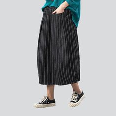 Make a statement in the 2023 Autumn Collection with this striped long women's denim skirt! Turn heads and channel the spirit of the millennium with this Y2K-inspired creation. boasting a high-waisted cut. sanded finish. and rubber closure. A unique blend of vintage and modern. this skirt promises to elevate your look with effortless sophistication.Why You'll Fall In LoveThis skirt is a timeless classic. offering a high-waisted silhouette with a unique. Y2K-inspired charm. Its vertical stripes. s Trendy Long Cotton Skirt, Black Cotton Midi Bottoms, Black Cotton Midi-length Bottoms, Fall Cotton Midi Bottoms, Spring Relaxed Fit Bottoms With Vertical Stripes, Baggy High-waisted Cotton Skirt, High Waist Baggy Cotton Skirt, Striped Cotton Relaxed Skirt, Trendy Cotton Midi Bottoms