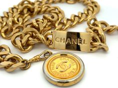 CHANEL Vintage Medallion Coin Chain Belt Yellow Gold Chain Link Jewelry With Gold-tone Logo, Formal Gold Jewelry With Metal Logo, Elegant Gold Jewelry With Metal Logo, Vintage Gold-tone Jewelry With Logo Charm, Vintage Jewelry With Gold-tone Logo Plaque, Vintage Necklace With Logo Charm For Formal Occasions, Vintage Gold Necklace With Gold-tone Logo Plaque, Luxury Gold Metal Chain Belt, Chanel Chain Belt