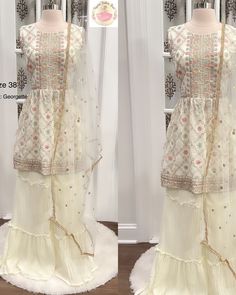 size 38 Product Name: Beautiful Ivory Color Sharara Set with Multicolor Sequin Work Description: Indulge in sheer elegance with our Beautiful Ivory Color Sharara Set featuring exquisite multicolor sequin work. This stunning ensemble exudes sophistication and charm, perfect for those special occasions that demand attention. The ivory color adds a touch of grace, while the intricate multicolor sequin detailing elevates the outfit's allure. The set includes a beautifully designed kurta-style top an White Sequin Sets For Eid, Elegant White Palazzo Set For Festivals, Multicolor Palazzo Set With Mirror Work For Reception, Fitted Off White Sharara With Sheer Dupatta, White Sequined Sharara For Festive Occasions, Embellished White Salwar Kameez For Wedding, Fitted Cream Palazzo Set With Dupatta, Festive White Sequined Sharara, White Embellished Semi-stitched Salwar Kameez