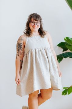 "The Boxy Tank Babydoll Dress! Handmade 100% Linen, 5.3 oz One Size - fits sizes Small - X Large comfortably  Fit is boxy, loose, flowy Woman in photo is wearing #1 - Mix Natural Her measurements are 38\" bust, 32\" waist, 45\" hips, and 4'11\" tall 21\" pit to pit, 14\" shoulder to waist, 34\" full length Color options: 1 - Mix Natural 2 - White 3 - Black Made to order, please allow 3-4 weeks before shipping If you're looking for another color, please send me a message and we can see if that color is available Sign up for my email list and get $5 off your next purchase! Plus, first-look at new launches, collaboration tops, and quilt jackets before anyone else. http://eepurl.com/ilO10E" Babydoll Shirt Outfit, Shirt Outfit Plus Size, Plus Size Babydoll, Babydoll Style Dress, Babydoll Shirt, Outfit Plus Size, Inspo Looks, Baby Doll Dress, Dress Handmade