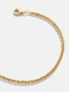 When it comes to the Avery 18K Gold Bracelet, less is more. A single 18K gold chain makes a statement and creates texture to revitalize your go-to look. Adjust the clasp to create your perfect fit and see how even simple styles can make an impression. Gold Charm Bracelet Fine Jewelry Style, Yellow Gold Plated Tennis Bracelet With Jubilee Style, Yellow Gold Plated Tennis Jubilee Bracelet, Fine Jewelry Yellow Gold Bracelets With Spring Ring Clasp, Yellow Gold Adjustable Bracelet, Adjustable Yellow Gold Bangle Bracelet, Gold Bracelet With Spring Ring Clasp, Modern Gold Plated Bracelets With Lobster Clasp, Yellow Gold Chain Bracelet With Spring Ring Clasp