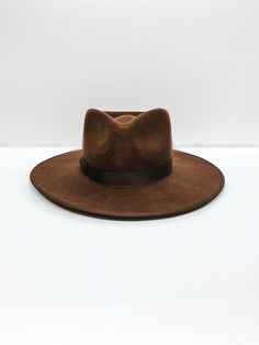 Inspired by vintage men’s styles, this hat is designed to make a statement. A stiffened wool fedora with rigid crown design. Trimmed on hat and rim with tonal grosgrain ribbon. Speckled Grey 100% soft Australian wool Tonal Light Gold grosgrain ribbon This hat is crafted from 100% Australian wool, a completely natural, renewable and biodegradable fibre Brim measures 10 cm / 3.95” Grosgrain edged hat rim and bow ribbon detail Classic crown height Rigid crown design This hat is accredited with a UP Classic Brown Flat Brim Felt Hat, Formal Brown Wool Hat, Brown Brimmed Felt Hat For Formal Occasions, Classic Wide Brim Fur Felt Hat, Flat Crown Fur Felt Fedora, Classic Brown Hat With Flat Crown, Brown Fur Felt Fedora With Short Brim, Classic Brown Felt Hat With Curved Brim, Classic Brown Felt Hat With Flat Crown