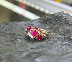 10kt White & Yellow Gold Pink Heart Sapphire Ring  the ring is in very nice condition it is two tone gold stamped 10kt there are 3 pink sapphires, each in the shape of a heart  there is a total of approximately 1 carat of sapphires combined the ring is a size 6 weight is 2.6 grams Pink Ruby Ring Stamped 14k For Anniversary, Van Nuys, 1 Carat, Pink Sapphire, Pink Heart, Rings Statement, A Heart, Sapphire Ring, Yellow White