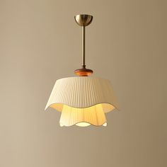 The Bellevue Pendant Lamp brings a touch of French countryside charm to any room. Its double-layer wavy lampshade design, paired with warm off-white fabric, creates a soft and inviting glow. Elegant and romantic, this lamp is perfect for adding a cozy atmosphere to any space. If you have any questions about our products, please get in touch with us and we will reply to you within 24 hours. Product Size Size: Dia 25cm x H 34cm / ∅ 9.8″ x H 13.4″ Size: Dia 50cm x H 35cm / ∅ 19.7″ x H 13.8″ Size: D Wavy Lampshade, Hallway Wall Lights, Tiffany Style Table Lamps, Chandelier Art, Kitchen Island Chandelier, Lampshade Designs, Ceiling Lamp Shades, Farmhouse Chandelier, Kitchen Pendants