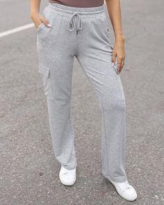 straight leg sweatpants Gray Stretch Sweatpants For Leisure, Stretch Gray Sweatpants For Leisure, Gray Leisure Sweatpants With Side Pockets, Gray Stretch Pants For Leisure, Gray Athleisure Pants With Pockets, Gray Leisure Joggers, Sporty Stretch Gray Cargo Pants, Gray Comfortable Activewear With Pockets, Comfortable Stretch Gray Sweatpants