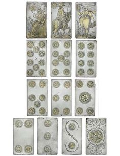 six playing cards with different designs and numbers on them, all in silver foiled paper