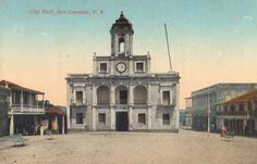 an old photo of a building with a clock tower