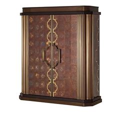 a brown cabinet with gold trimmings on the doors