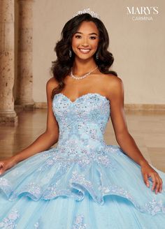 Look timeless in this lace applique long strapless dress with A-line skirt by Mary's Bridal Quinceanera MQ1098. This glitter tulle quinceanera ball gown features a sweetheart neckline, lace appliques, beading, peplum skirt, lace-up back closure, sweep train, and a bolero jacket. Mary's Bridal Carmina Collection: Spring 2022 Style Number: MQ1098 Fabric: Tulle, Glitter Tulle, Applique, Beading Colors: Light Blue Sizes Available (as of 12/2/2024): 12, 14, 16 Occasion: Quinceañera, Sweet 16, Debutan Long Strapless Dress, Quinceañera Dresses, Tulle Applique, Rachel Allan Prom Dresses, Mary's Bridal, Debutante Ball, 2022 Style, Peplum Skirt, Quinceanera Dress