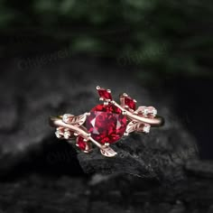 "This is a round 6.5mm  1ct lab red ruby engagement ring in solid gold,  The accent stones are lab red ruby and diamonds or moissanites. The band width is about 1.3mm. It can be made in any ring size. However please contact me to custom make it to a special big or small size. It can be made in white gold,rose gold or yellow gold with 14k or 18k. However for some people who are nickel allergic,I can also make it to 925 sterling silver to make you can wear it. The ring is handmade,very high quality! 30 days money back guarantee. Returns & Warranty 30-Day money back guarantee (starting from the day of delivery). \"Made to Order\" purchases qualify for our 30-day money back guarantee. The 30-day money back guarantee gives you time to make sure your purchase is perfect. If you need to  return i Red Engagement Ring, Red Diamond Ring, Garnet Ring Vintage, Ruby Wedding Rings, Cluster Diamond Ring, Rose Gold Leaf, Engagement Ring Women, Garnet Engagement Ring, Natural Ruby Ring