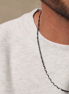 Jewelry for Men - Black and Silver anchor style chain necklace - Two tone black jewelry - Modern, Minimalist Gifts for guys, dad, son, bff Links: 3mm wide Material: 925 Sterling Silver (with ruthenium coating) Clasp: Lobster Claw Kyle is wearing the 20 inch. His neck measures 15 1/2 inches. Made in the USA. Black Figaro Chain Necklace As Gift, Black Figaro Chain Necklace For Gift, Black Figaro Chain Necklace Gift, Everyday Black Link Chain Necklace, Everyday Black Necklace With Cable Chain, Black Sterling Silver Link Necklace, Black Sterling Silver Link Chain Necklace, Gifts For Guys, Anchor Chain