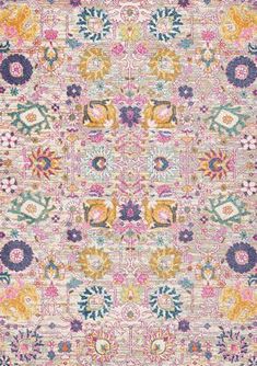 a multicolored rug with an intricate design on the front and back side, in various colors