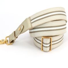 Our signature detachable, interchangeable, and adjustable bag straps are designed to give you maximum versatility for all your favorite handbags. Simply switch out your strap or change the size to give your purse and your outfit a whole new look. Backed in ultra-soft leather, these interchangeable purse straps are as durable as they are comfortable. Every striped strap features a gold slider so you can adjust it from a shoulder strap to a cross-body strap. And, our custom hardware is durable eno Versatile Detachable Shoulder Strap For Everyday, Chic Long Strap Bag Strap For Everyday Use, Versatile Adjustable Crossbody Bag Strap, Adjustable Crossbody Bag Strap, Adjustable Versatile Crossbody Bag Strap, Beige Rectangular Bag Strap For Travel, Rectangular Beige Bag Strap For Travel, Versatile Detachable Crossbody Bag Strap, Beige Bag With Strap For Everyday Use