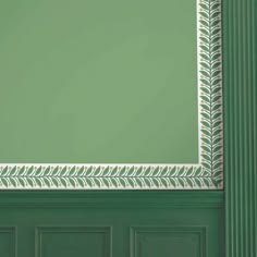 a green door with a white border on it