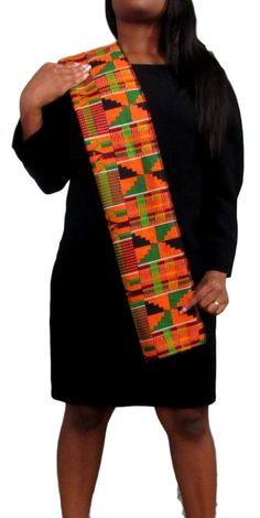 PRICES MAY VARY. Kente Scarf, Kente Stole, Kente Sash Perfect for Kwanzaa and Black History Month African clothing accessory made in kente cloth designs originating in Ghana Wonderful table runners to add an African flavor to any environment Perfect for choir and graduation. Also use as scarf, head wrap, belt, table runner or wall hanging, Table Runner. Approx. 11.75" wide X 44" long Kente Scarf, Kente Stole, Kente Sash Perfect for Kwanzaa and Black History Month African clothing accessory made Kente Cloth Designs, Kente Scarf, Cloth Designs, Scarf Head Wrap, Kente Cloth, Scarf Outfit, Fashion Scarves, African Pattern, Kwanzaa