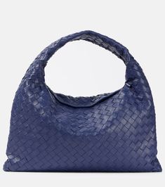 Find BOTTEGA VENETA Hop Small Leather Tote Bag on Editorialist. The Bottega Veneta Hop Small leather tote bag is crafted from calf leather with a calf leather lining. It features a top handle, a magnetic fastening and an internal zipped pocket. The bag is made in Italy. Blue Calf Leather Shoulder Bag For Evening, Blue Woven Leather Bag, Blue Leather Shoulder Bag With Woven Detail, Blue Woven Leather Bags For Daily Use, Modern Blue Woven Leather Bag, Chic Blue Calf Leather Bag, Blue Woven Leather Shoulder Bag, Blue Woven Leather Top Handle Shoulder Bag, Blue Top Handle Bag With Intrecciato Weave