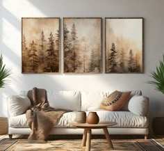 a living room with two paintings on the wall