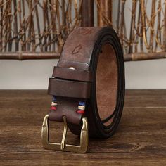 Complete your look with the timeless elegance of the Aisha leather belt for men. Crafted from high-quality materials, you'll appreciate its unique and innovative design, distinguished by its roller buckle and ethnic motif. Unique and stylish, it's the perfect complement for men of taste! Brown Artisan Belt With Antique Buckle, Artisan Brown Belt With Antique Buckle, Adjustable Artisan Leather Belt Buckles, Adjustable Brown Traditional Belt Buckles, Traditional Adjustable Brown Belt Buckles, Artisan Leather Belt Buckle With Antique Design, Artisan Brown Belt Buckle With Belt Included, Brown Leather Belt With Embroidery, Adjustable Embroidered Leather Belt