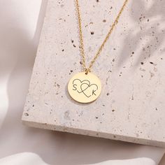 💖Customize a couple necklace exclusively for you two with the initials of each other's names. This disc initial necklace, with a minimalist style design, engraves the initials of your names, making this necklace a love token exclusively for you. Every time you wear it, it is a testimony to your love for each other. 💖The perfect gift for your loved one. ►Actual Handwriting Necklace * Perfect for daily wear, showcasing your deep bond. * Each necklace is meticulously polished to ensure that the e Personalized Heart Initial Necklace For Anniversary, Personalized Heart Initial Necklace For Anniversary Gift, Double Heart Initials Necklaces For Anniversary Gift, Personalized Couples Necklaces For Anniversary, Valentine's Day Initial Pendant Name Necklace For Anniversary, Personalized Couples Necklace For Anniversary, Valentine's Day Anniversary Initial Pendant Name Necklace, Valentine's Day Initial Necklace For Anniversary Gift, Heart-shaped Initial Necklace For Anniversary Gift