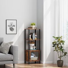 a living room with a couch, chair and bookcase in it's corner