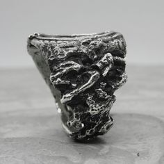 Unique Hand Forged Wide Band Ring, Brutalist Style Open Ring Jewelry, Brutalist Open Ring With Oxidized Finish, Brutalist Oxidized Open Ring Jewelry, Silver Wide Band Ring Hand Cast, Silver Wide Band Hand Cast Ring, Brutalist Hand Cast Open Ring, Silver Sterling Jewelry With Unique Texture, Unique Oxidized Wide Band Rings