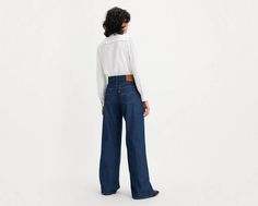 The kind of jeans you might steal from your parent's closet;but baggier. With a mid rise, wide-leg cut and straight leg, our Baggy Dad Wide-Leg jeans are relaxed yet flattering with extra room for a subtle edge. A fit inspired by the way dads rock their jeans;but baggier Featured in a mid rise with a wide leg Roomy and slouchy through the hip and thigh Mid Rise, Wide Leg Jeans, Wide Leg, Straight Leg, Women Jeans, Clothes