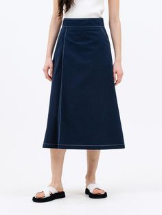 This is a clean and comfortable skirt by Jun by Jun k. that is made out of high quality and sturdy material. With distinctive mood of the design and comfortable wear, you can style it for your minimal daily outfit.- Contrasting color stitches detail- Bio washed cotton fabric- Minimal and clean comfortable mood Cotton Midi-length Workwear Bottoms, Cotton Midi Bottoms For Work, Cotton Midi-length Bottoms For Work, Versatile Cotton Skirt With Relaxed Fit, Modern Fitted Cotton Skirt, Navy Cotton Lined Skirt, Versatile Cotton Skirt For Work, Versatile Cotton Skirt, Navy Cotton Lined Skirt Bottoms