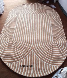 a large rug is on the floor next to a radiator